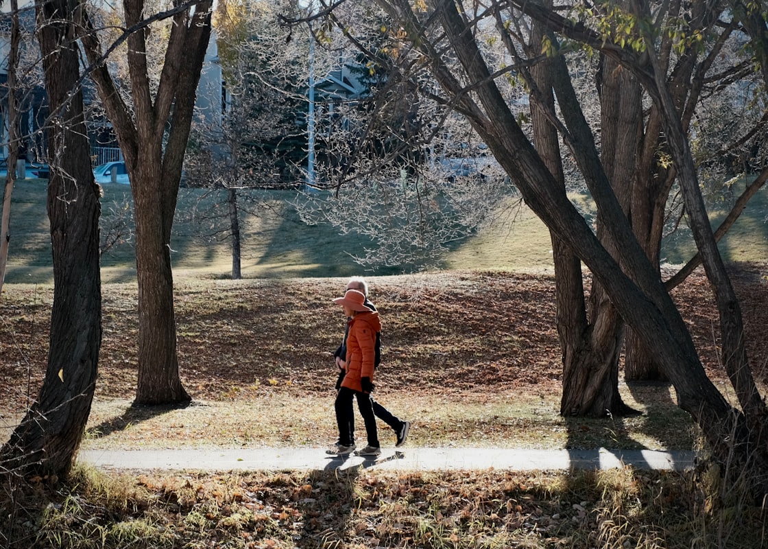 Older man performing strength exercises outdoors