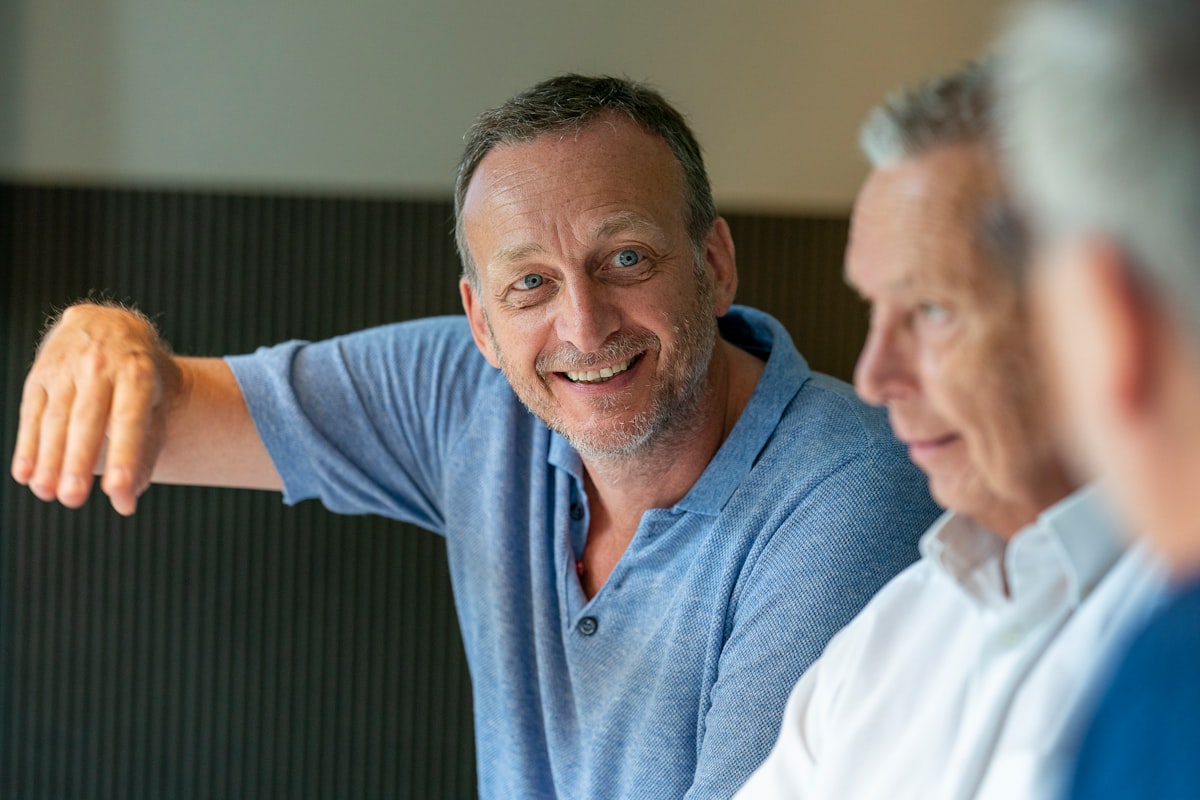 Older men exercising together in a fitness group